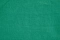 Coarse woven canvas in a green hue. Cotton texture. Macro. Color Name: tropical rain forest