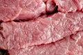 Coarsely chopped pieces of beef. The concept of cholesterol food. Raw meat