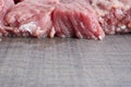 Coarsely chopped pieces of beef. The concept of cholesterol food. Raw meat
