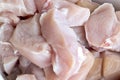 Coarsely chopped pieces of chicken fillet. Raw meat before cooking