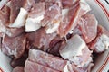 Coarsely chopped pieces of pork. The concept of cholesterol food. Raw meat before cooking