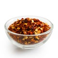 Coarsely ground chilli peppers in glass bowl. Royalty Free Stock Photo