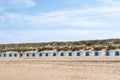 On the coast with beach huts Royalty Free Stock Photo