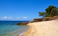 Coast with beach and rocks, sea landscape and the beautiful clouds in the blue sky Royalty Free Stock Photo