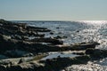 Coast of the Black Sea at sunset. Scenic sea landscape with blue water with rocky coast Royalty Free Stock Photo