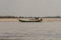 Coast of a Burmese river with boat