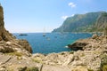 Coast of Capri Island with yachts in a beautiful summer day, Italy Royalty Free Stock Photo