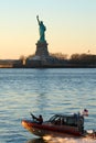 Coast Guard Gunboat in front of Statue of Liberty Royalty Free Stock Photo