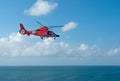 Coast Guard Helicopter over water Royalty Free Stock Photo