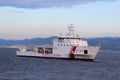 Coast guard and Tugs in Front of the port of Genoa Voltri