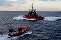 Coast guard and Tugs in Harbor at the port of Genoa Voltri