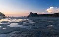 Coast of the island at low tide at sunset Royalty Free Stock Photo