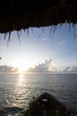 coast kenya mombasa, sunrise at sea. Indian ocean at sunrise, palm trees and a view to the horizon. Beautiful morning at the beach Royalty Free Stock Photo