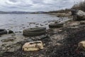 Coast of the Kola Bay, pollution of the coastline with waste Royalty Free Stock Photo