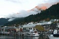 Waterfront town with morning orange sunlight on mountain