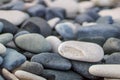 Pebbles on the Mediterranean Sea coastline a close up Royalty Free Stock Photo