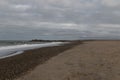 Coast line at Thyboron on the Danish west coast, clouds in the s Royalty Free Stock Photo