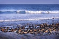 Coast of Malibu, California waves, rocks and beach.