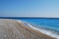 Coast of Mediterranean Sea. pebble beach at the Sunny Day Royalty Free Stock Photo