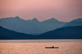 The Coast mountains by English Bay in Vancouver as the sun sets Royalty Free Stock Photo