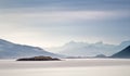 Coast of Norway sea in clouds of haze. Beacon on a rock Royalty Free Stock Photo