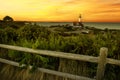 Coast of the ocean with a view of the lighthouse. Maine`s famous lighthouse at sunset. USA. Maine. Royalty Free Stock Photo