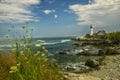 Coast of the ocean with a view of the lighthouse. Maine`s famous lighthouse. USA. Maine. Royalty Free Stock Photo