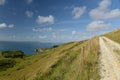 Coast path and lighthouse, Portland Bill Royalty Free Stock Photo