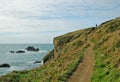 Coast Path near Polpeor Cove Lifeboat Station and Lizard Lighthouse, The Lizard, Cornwall, England, UK Royalty Free Stock Photo