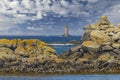 Coast with Phare du Four near Argenton in Brittany, France Royalty Free Stock Photo