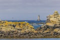 Coast with Phare du Four near Argenton in Brittany, France Royalty Free Stock Photo