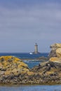 Coast with Phare du Four near Argenton in Brittany, France Royalty Free Stock Photo