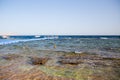 Coast of the Red Sea, Egypt. surf line. Wind and waves. A little storm. Background tourism and travel. Blue water and sky Royalty Free Stock Photo