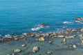 Coast rock beach and turquoise waters.