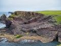 Coast rock formations at Eshaness on Shetland, Scotland, UK - the rocks are of the Eshaness Volcanic Formation Royalty Free Stock Photo