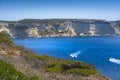 Coast and sea at Bonifacio with a blue sky, Corsica Royalty Free Stock Photo