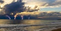 Dramatic dark stormy sky and lightning over a sea Royalty Free Stock Photo