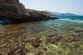 Coast with stones. Water interruptions through the stones Royalty Free Stock Photo