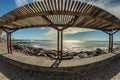 Coast walking path in Las Americas. Original look at the sun canopy. Tenerife