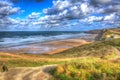 Coast at Watergate Bay Cornwall England UK between Newquay and Padstow in colourful HDR Royalty Free Stock Photo