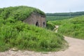 Coastal anti-landing caponier No. 5 in the Bay of Akhlestyshev on Russian island. Russia, Vladivostok Royalty Free Stock Photo