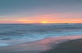 Coastal Background Sea, Sand, and Sunrise Sky in Outer Banks NC Royalty Free Stock Photo