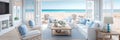 Coastal beach house living room with a breezy, nautical theme and coastal decor. Royalty Free Stock Photo