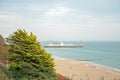 Coastal beach scenery and Bournemouth pier along Bournemouth beach in Dorset. Royalty Free Stock Photo