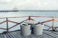 Coastal cafe with table and chairs Royalty Free Stock Photo