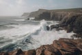 coastal cliffs with rock formations jutting out and waves crashing against the rocks Royalty Free Stock Photo