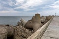 Coastal concrete fortifications. Reinforced concrete structures along the sea pier