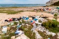 Coastal degradation with dirty beach, rubbish and domestic waste polluting the Capaci beach in province of Palermo. Royalty Free Stock Photo