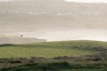 Coastal fields along the headlands at dusk Royalty Free Stock Photo