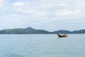 fishing boat Close to the island in the sea Royalty Free Stock Photo